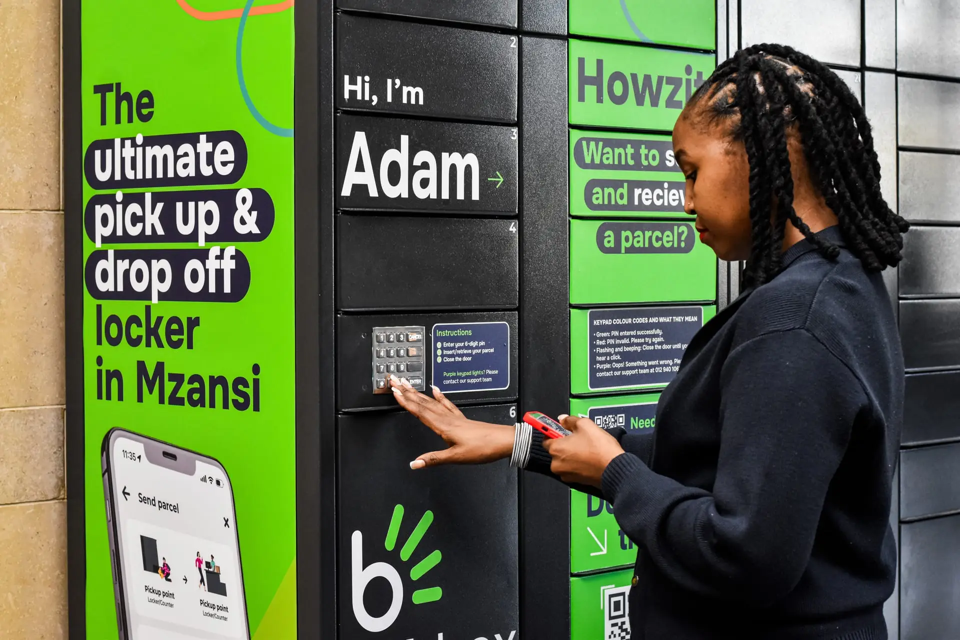 A customer arrives at a Bob Box locker, phone in hand, ready to collect their parcel.